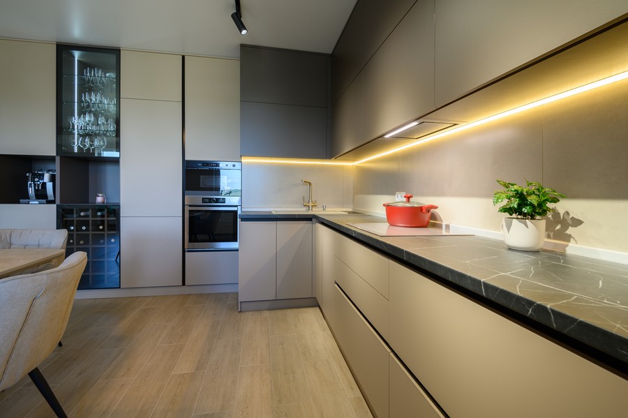 A modern smart home kitchen with beautiful lighting design.